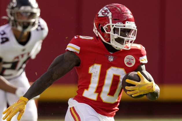 Kansas City Chiefs wide receiver Tyreek Hill runs during the first half of an NFL football game against the Atlanta Falcons Sunday, Dec. 27, 2020, in Kansas City, Mo. (AP Photo/Charlie Riedel)
