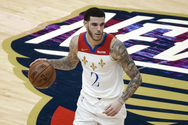 New Orleans Pelicans guard Lonzo Ball (2) against the Charlotte Hornets in the second half of an NBA basketball game in New Orleans, Friday, Jan. 8, 2021. (AP Photo/Derick Hingle)