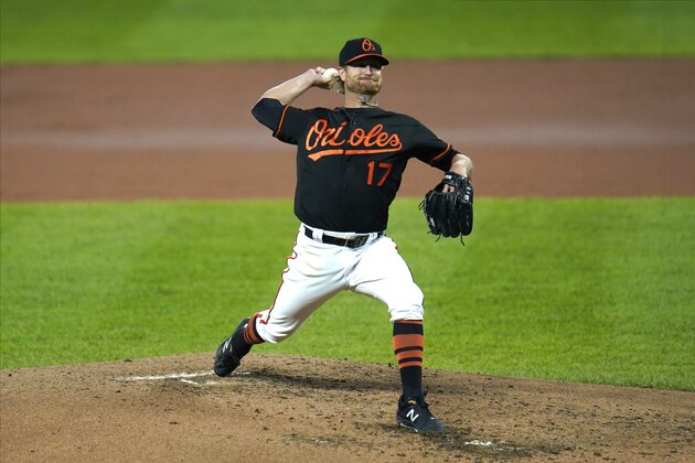 Baltimore Orioles starting pitcher Alex Cobb throws a pitch to the Tampa Bay Rays during the third inning of a baseball game, Friday, Sept. 18, 2020, in Baltimore. (AP Photo/Julio Cortez)