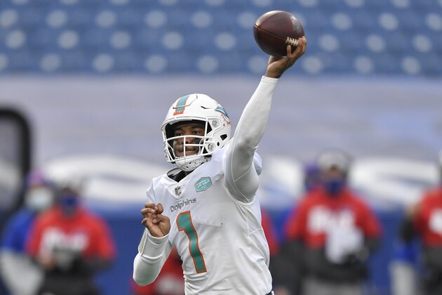 Miami Dolphins quarterback Tua Tagovailoa (1) passes in the second half of an NFL football game against the Buffalo Bills, Sunday, Jan. 3, 2021, in Orchard Park, N.Y. (AP Photo/Adrian Kraus)