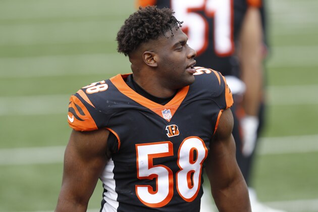 Cincinnati Bengals defensive end Carl Lawson (58) warms up before an NFL football game against the Baltimore Ravens, Sunday, Jan. 3, 2021, in Cincinnati. (AP Photo/Aaron Doster)