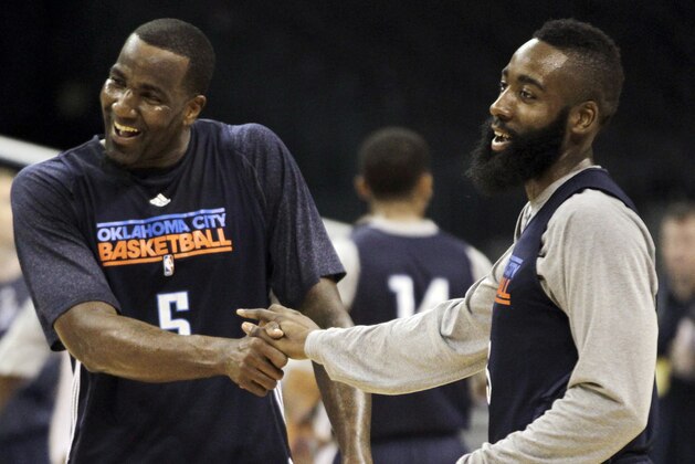 Oklahoma City Thunder center Kendrick Perkins (5) and James Harden joke around during practice, Monday, June 11, 2012, in Oklahoma City. Game 1 of  NBA finals basketball between the Miami Heat and Thunder is Tuesday. (AP Photo/Jeff Roberson)