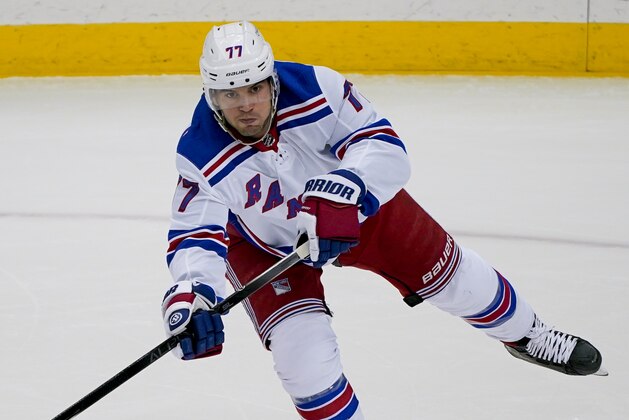 FILE - In this Jan. 22, 2021, file photo, New York Rangers' Tony DeAngelo gets off a pass during the first period of an NHL hockey game against the Pittsburgh Penguins in Pittsburgh. General manager Jeff Gorton says DeAngelo has played his final game for the Rangers despite going unclaimed on waivers. Gorton said the 25-year-old defenseman will not be around the team after an undisclosed â€œincident.