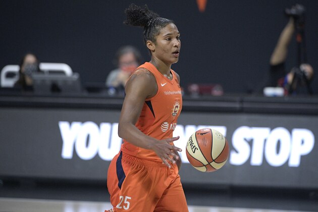 Connecticut Sun forward Alyssa Thomas (25) brings the ball up the court during the second half of Game 5 of a WNBA basketball semi-final round playoff series against the Las Vegas Aces, Tuesday, Sept. 29, 2020, in Bradenton, Fla. (AP Photo/Phelan M. Ebenhack)
