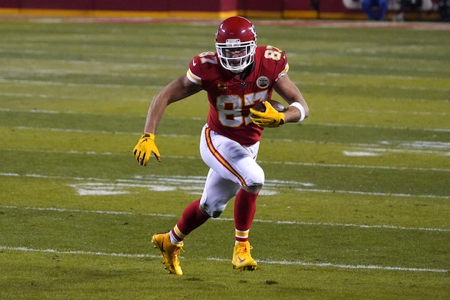Kansas City Chiefs tight end Travis Kelce runs up field after catching a pass during the first half of the AFC championship NFL football game against the Buffalo Bills, Sunday, Jan. 24, 2021, in Kansas City, Mo. (AP Photo/Jeff Roberson)