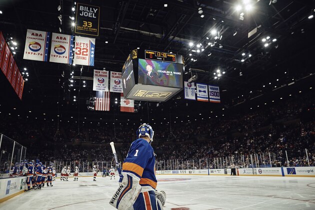 New York Islanders goalkeeper Thomas Greiss heads back to the net after a stoppage in play during the first period of the team's NHL hockey game against the Columbus Blue Jackets at Nassau Veterans Memorial Coliseum, on Saturday, Dec. 1, 2018, in Uniondale, N.Y. (AP Photo/Andres Kudacki)