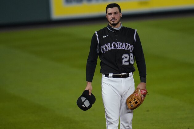 Colorado Rockies third baseman Nolan Arenado (28) in the fifth inning of a baseball game Saturday, Sept. 19, 2020, in Denver. (AP Photo/David Zalubowski)