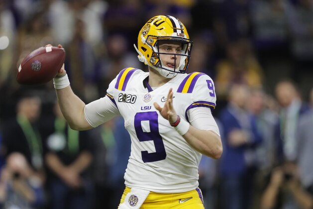 FILE - In this Jan. 13, 2020, file photo, LSU quarterback Joe Burrow throws a pass against Clemson during the second half of the NCAA College Football Playoff national championship game in New Orleans. No. 1 overall pick Burrow and the rest of the rookie class will begin preparing for their first seasons in the NFL at home instead of at minicamps and team facilities this month. (AP Photo/Gerald Herbert, File)