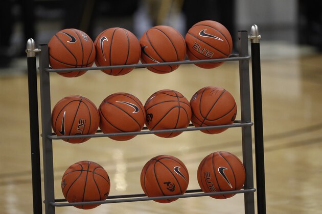 Basketballs sit in a rack in the first half of an NCAA college basketball game Thursday, Jan. 23, 2020, in Boulder, Colo. (AP Photo/David Zalubowski)