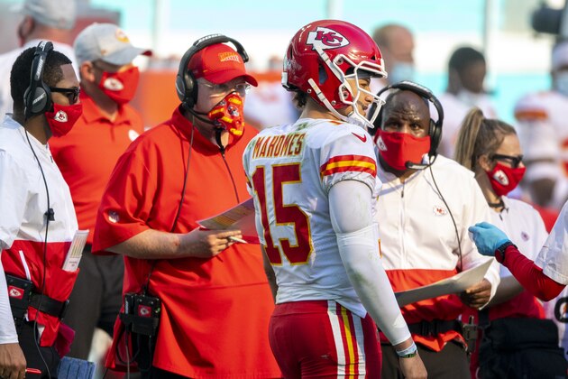 From left, Kansas City Chiefs head coach Andy Reid, Kansas City Chiefs quarterback Patrick Mahomes (15) and Kansas City Chiefs offensive coordinator Eric Bieniemy on the sidelines as the Chiefs take on the Miami Dolphins during an NFL football game, Sunday, Dec. 13, 2020, in Miami Gardens, Fla. (AP Photo/Doug Murray)
