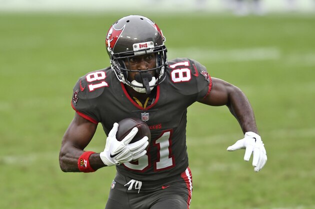 Tampa Bay Buccaneers wide receiver Antonio Brown (81) runs with the ball after a reception during the second half of an NFL football game against the Atlanta Falcons Sunday, Jan. 3, 2021, in Tampa, Fla. (AP Photo/Jason Behnken)