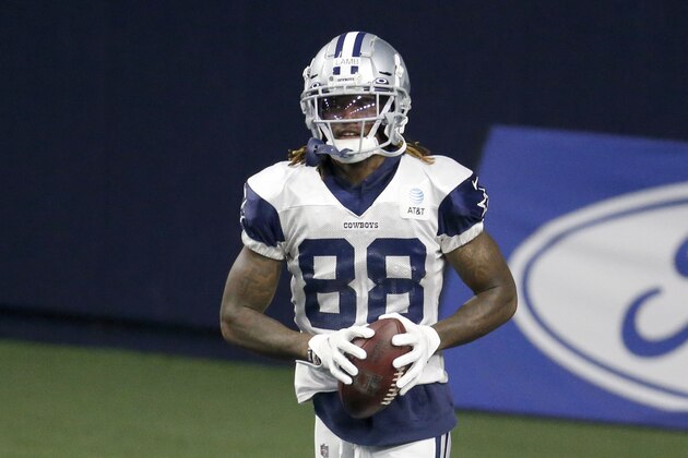 Dallas Cowboys wide receiver CeeDee Lamb (88) jogs back to the line of scrimmage during an NFL football training camp in Frisco, Texas, Sunday, Sept. 23, 2020. (AP Photo/Michael Ainsworth) Dallas Cowboys wide receiver CeeDee Lamb (88) jogs back to the line of scrimmage during an NFL football training camp in Frisco, Texas, Sunday, Sept. 23, 2020. (AP Photo/Michael Ainsworth)