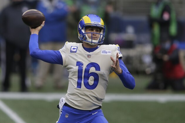 FILE - In this Jan. 9, 2021, file photo, Los Angeles Rams quarterback Jared Goff throws a pass against the Seattle Seahawks during the first half of an NFL wild-card playoff football game in Seattle.The Detroit Lions are trading quarterback Matthew Stafford to the Rams in exchange for Goff, two future first-round picks and a third-round pick, a person with knowledge of the deal tells The Associated Press. The person spoke on condition of anonymity Saturday night, Jan. 30, because the deal has not been completed. (AP Photo/Scott Eklund, File)