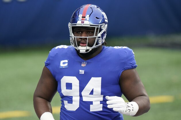 New York Giants' Dalvin Tomlinson warms-up before an NFL football game against the Dallas Cowboys, Sunday, Jan. 3, 2021, in East Rutherford, N.J. (AP Photo/Corey Sipkin)