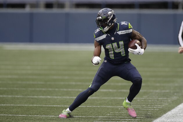 Seattle Seahawks wide receiver DK Metcalf in action against the New York Giants during an NFL football game, Sunday, Dec. 6, 2020, in Seattle. (AP Photo/Larry Maurer)