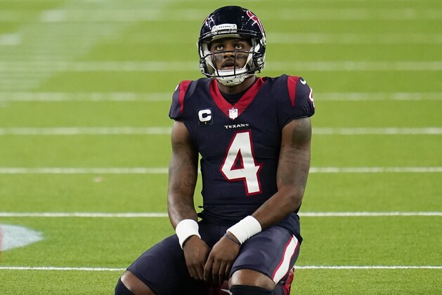 Houston Texans quarterback Deshaun Watson (4) kneels / sits on the field in frustration during an NFL football game against the Tennessee Titans, Sunday, Jan. 3, 2021, in Houston. (AP Photo/Matt Patterson)