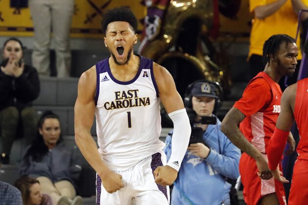 East Carolina's Jayden Gardner (1) reacts following a basket and being fouled during the second half of an NCAA college basketball game against Houston in Greenville, N.C., Wednesday, Jan. 29, 2020. (AP Photo/Karl B DeBlaker)