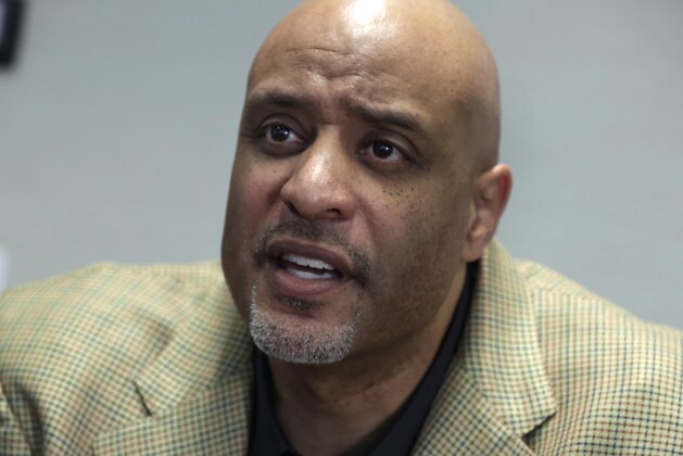 New baseball union head Tony Clark is interviewed at the organization's headquarters, in New York,  Wednesday, Jan. 15, 2014. Clark says players won't agree to terminating contracts as part of discipline for drug violations. Clark took over as the union's executive director following the death of Michael Weiner in November. (AP Photo/Richard Drew)