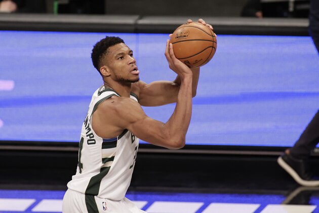 Milwaukee Bucks forward Giannis Antetokounmpo (34) in action during an NBA basketball game against the Brooklyn Nets, Monday, Jan. 18, 2021, in New York. The Nets won 123-125. (AP Photo/Adam Hunger)