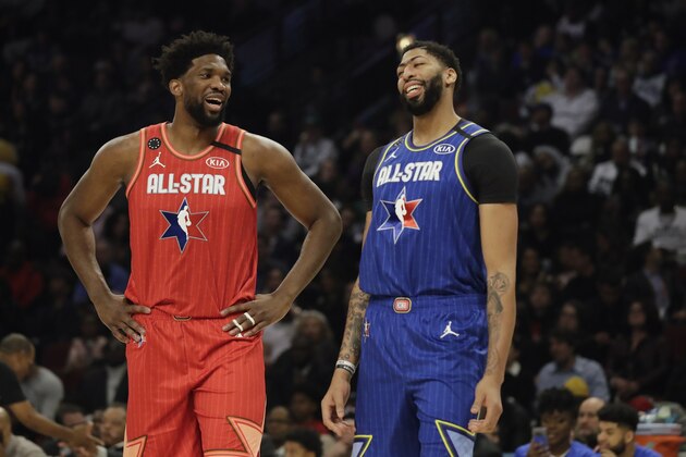 Joel Embiid of the Philadelphia 76ers and Anthony Davis of the Los Angeles Lakers talk during the second half of the NBA All-Star basketball game Sunday, Feb. 16, 2020, in Chicago. (AP Photo/Nam Huh)