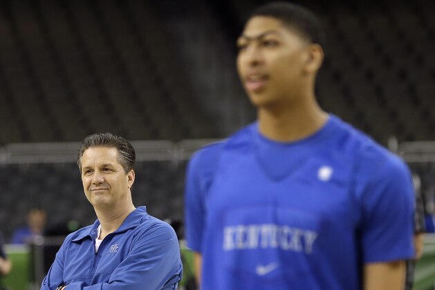 Kentucky head coach John Calipari watches forward Anthony Davis, right, during a practice session for the NCAA Final Four basketball tournament Friday, March 30, 2012, in New Orleans. Kentucky plays Louisville in a semifinal game on Saturday. (AP Photo/David J. Phillip)