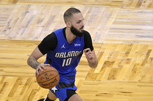 Orlando Magic guard Evan Fournier (10) brings the ball up the court during the second half of an NBA basketball game against the Sacramento Kings, Wednesday, Jan. 27, 2021, in Orlando, Fla. (AP Photo/Phelan M. Ebenhack)