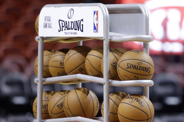 A rack of basketballs is shown before the start of an NBA basketball game between the Miami Heat and the Milwaukee Bucks, Wednesday, April 2, 2014 in Miami. (AP Photo/Wilfredo Lee) A rack of basketballs is shown before the start of an NBA basketball game between the Miami Heat and the Milwaukee Bucks, Wednesday, April 2, 2014 in Miami. (AP Photo/Wilfredo Lee)