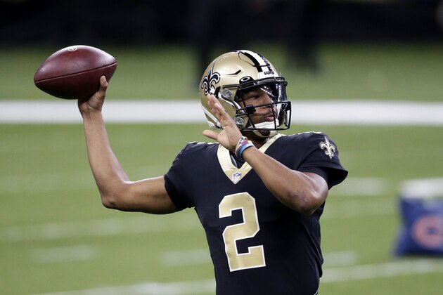 New Orleans Saints quarterback Jameis Winston (2) warms up before an NFL wild-card playoff football game against the Chicago Bears in New Orleans, Sunday, Jan. 10, 2021. (AP Photo/Butch Dill)