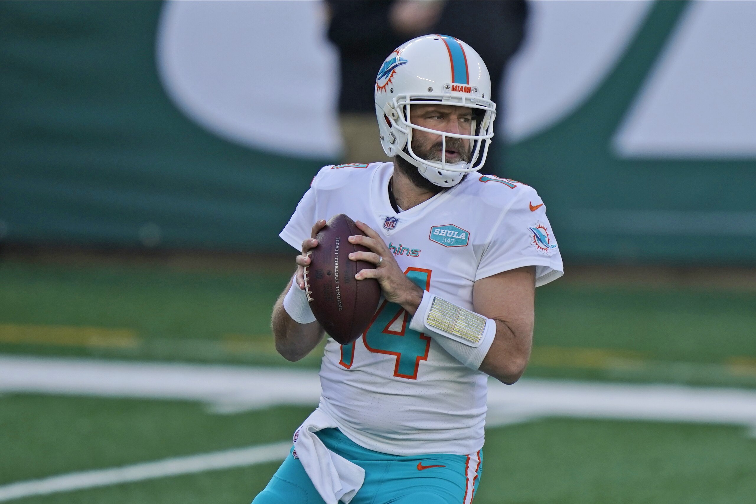 Miami Dolphins quarterback Ryan Fitzpatrick looks to throw during the first half of an NFL football game against the New York Jets, Sunday, Nov. 29, 2020, in East Rutherford, N.J. (AP Photo/Corey Sipkin)