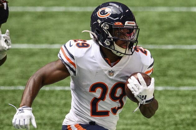 Chicago Bears running back Tarik Cohen (29) runs the ball during the first half of an NFL football game against the Atlanta Falcons, Sunday, Sept. 27, 2020, in Atlanta. The Chicago Bears won 30-26. (AP Photo/Danny Karnik)