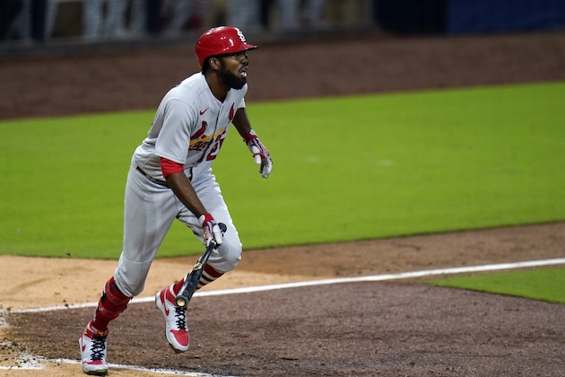 St. Louis Cardinals' Dexter Fowler watches his RBI-double during the sixth inning of Game 2 of a National League wild-card baseball series against the San Diego Padres, Thursday, Oct. 1, 2020, in San Diego. (AP Photo/Gregory Bull)