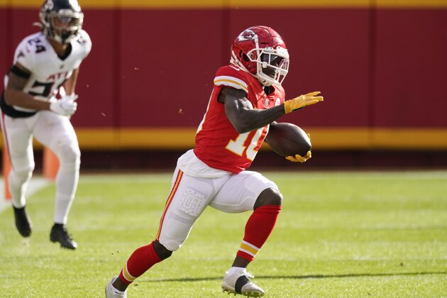 Kansas City Chiefs wide receiver Tyreek Hill runs up field during the first half of an NFL football game against the Atlanta Falcons, Sunday, Dec. 27, 2020, in Kansas City. (AP Photo/Charlie Riedel)