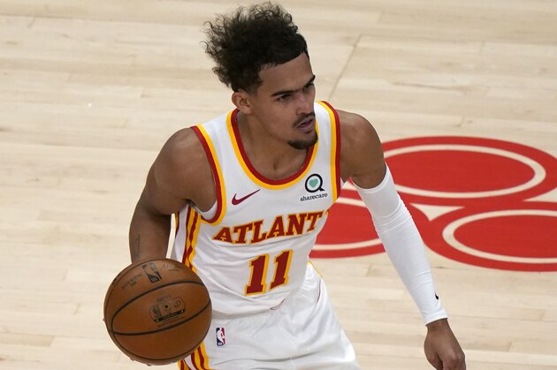 Atlanta Hawks guard Trae Young (11) is shown against the Dallas Mavericks in the second half of an NBA basketball game Wednesday, Feb. 3, 2021, in Atlanta. (AP Photo/John Bazemore)