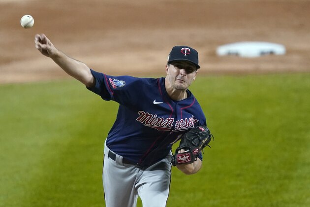 Minnesota Twins starting pitcher Jake Odorizzi delivers during the first inning of the team's baseball game against the Chicago White Sox on Wednesday, Sept. 16, 2020, in Chicago. (AP Photo/Charles Rex Arbogast)