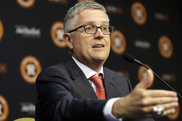 Houston Astros' Jeff Luhnow answers a question during a news conference to announce his promotion to President of Baseball Operations and General Manager Monday, June 18, 2018, in Houston. Luhnow's new contract runs through the 2023 season. (AP Photo/David J. Phillip)