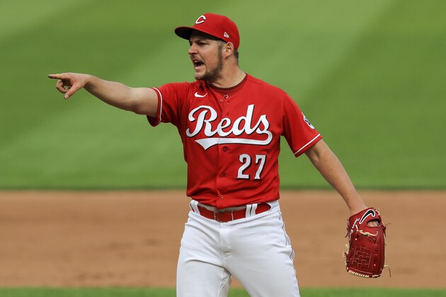 Cincinnati Reds' Trevor Bauer reacts to umpire Tim Timmons for a call on his pitch in the seventh inning during a baseball game against the Pittsburgh Pirates in Cincinnati, Monday, Sept. 14, 2020. The call would result in a strikeout. (AP Photo/Aaron Doster)