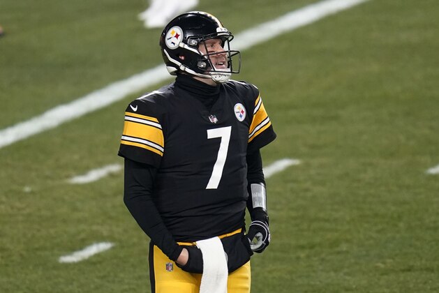 Pittsburgh Steelers quarterback Ben Roethlisberger (7) walks off the field after Cleveland Browns strong safety Karl Joseph (42) recovered a fumbled snap for a touchdown during the first half of an NFL wild-card playoff football game, Sunday, Jan. 10, 2021, in Pittsburgh. (AP Photo/Keith Srakocic)