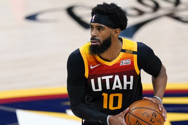 Utah Jazz guard Mike Conley (10) in the first half of an NBA basketball game Sunday, Jan. 31, 2021, in Denver. (AP Photo/David Zalubowski) Utah Jazz guard Mike Conley (10) in the first half of an NBA basketball game Sunday, Jan. 31, 2021, in Denver. (AP Photo/David Zalubowski)
