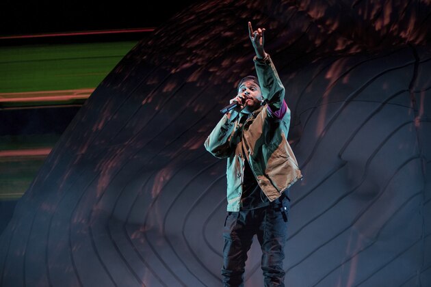 The Weeknd performs at Coachella Music & Arts Festival at the Empire Polo Club on Friday, April 13, 2018, in Indio, Calif. (Photo by Amy Harris/Invision/AP)