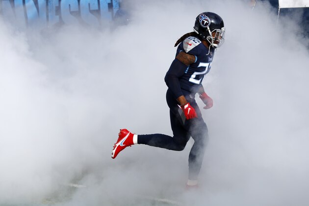 Tennessee Titans running back Derrick Henry (22) is introduced before an NFL wild-card playoff football game between the Titans and the Baltimore Ravens Sunday, Jan. 10, 2021, in Nashville, Tenn. (AP Photo/Wade Payne)