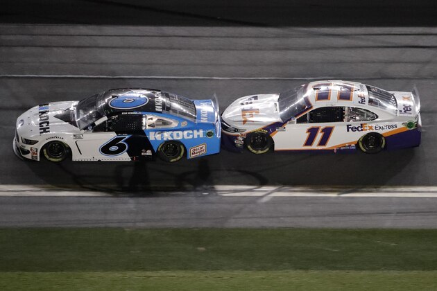 Denny Hamlin (11) drafts Ryan Newman (6) during the NASCAR Daytona 500 auto race Monday, Feb. 17, 2020, at Daytona International Speedway in Daytona Beach, Fla. Sunday's running of the race was postponed by rain. (AP Photo/Chris O'Meara)