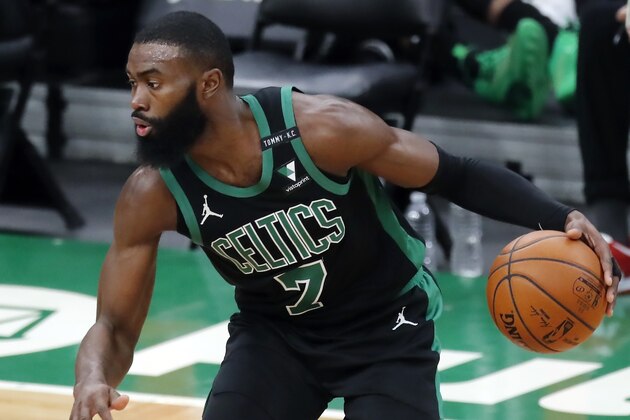Boston Celtics' Jaylen Brown plays against the Cleveland Cavaliers during the first half of an NBA basketball game, Sunday, Jan. 24, 2021, in Boston. (AP Photo/Michael Dwyer)
