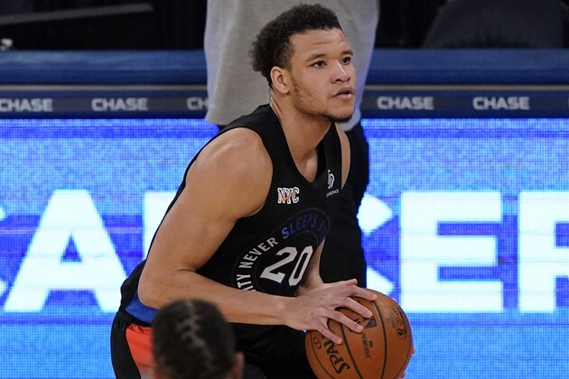 New York Knicks forward Kevin Knox II (20) looks to pass during an NBA basketball game against the Orlando Magic, Monday, Jan. 18, 2021, in New York. (AP Photo/Kathy Willens)