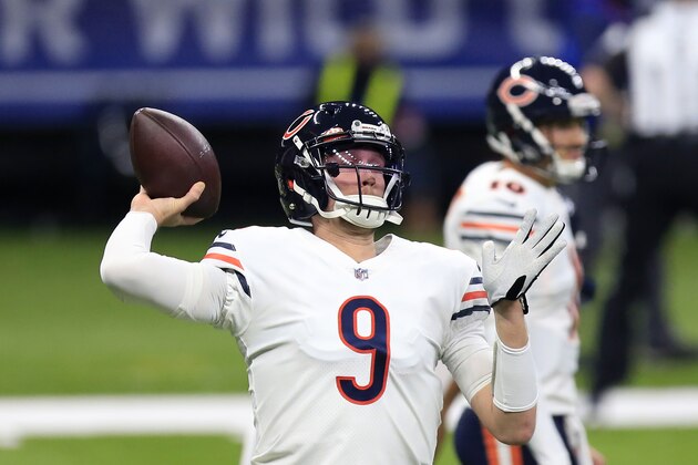 Chicago Bears quarterback Nick Foles (9) warms up before an NFL wild-card playoff football game against the New Orleans Saints in New Orleans, Sunday, Jan. 10, 2021. (AP Photo/Brett Duke)