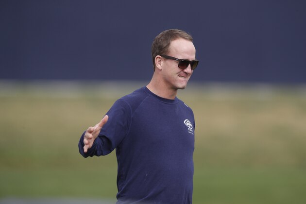 Retired NFL quarterback Peyton Manning during a combined NFL football training camp at the Broncos' headquarters Friday, Aug. 16, 2019, in Englewood, Colo. (AP Photo/David Zalubowski)