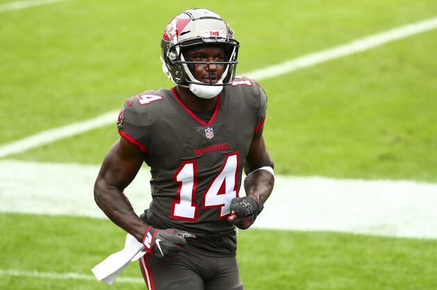 Tampa Bay Buccaneers wide receiver Chris Godwin (14) walks to the locker room prior to an NFL football game against the Atlanta Falcons, Sunday, Jan. 3, 2021, in Tampa, Fla. (AP Photo/Kevin Sabitus)
