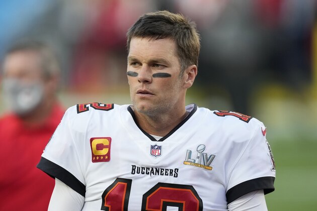 Tampa Bay Buccaneers quarterback Tom Brady stands on the field before the NFL Super Bowl 55 football game between the Kansas City Chiefs and Buccaneers, Sunday, Feb. 7, 2021, in Tampa, Fla. (AP Photo/Chris O'Meara)