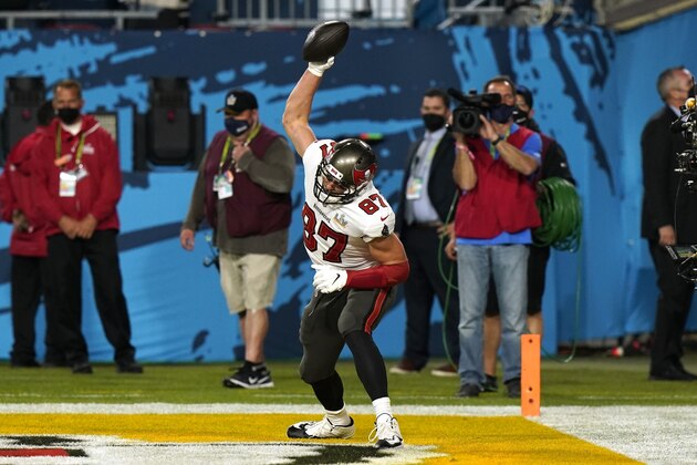Tampa Bay Buccaneers tight end Rob Gronkowski celebrates after catching an 8-yard touchdown pass during the first half of the NFL Super Bowl 55 football game against the Kansas City Chiefs Sunday, Feb. 7, 2021, in Tampa, Fla. (AP Photo/Lynne Sladky)