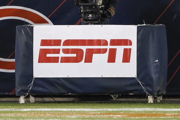 A detail view of a ESPN Monday Night Football television camera and ESPN banner is seen on the sideline during the first half of an NFL football game between the Chicago Bears and Minnesota Vikings, Monday, Nov. 16, 2020, in Chicago. (AP Photo/Kamil Krzaczynski)