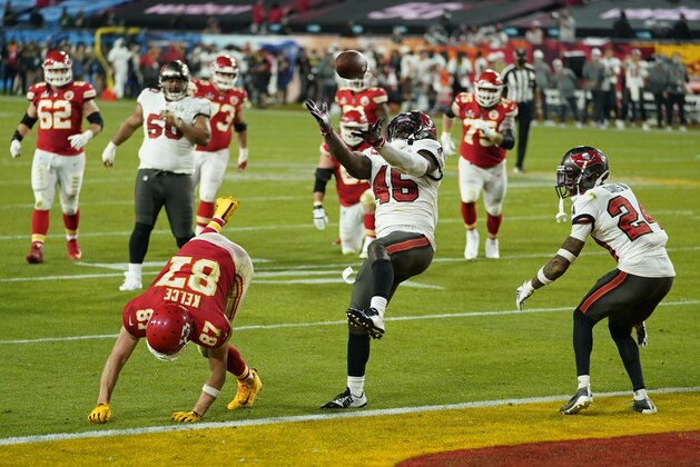Tampa Bay Buccaneers inside linebacker Devin White makes an interception against Kansas City Chiefs tight end Travis Kelce during the second half of the NFL Super Bowl 55 football game Sunday, Feb. 7, 2021, in Tampa, Fla. (AP Photo/Mark Humphrey) Tampa Bay Buccaneers inside linebacker Devin White makes an interception against Kansas City Chiefs tight end Travis Kelce during the second half of the NFL Super Bowl 55 football game Sunday, Feb. 7, 2021, in Tampa, Fla. (AP Photo/Mark Humphrey)